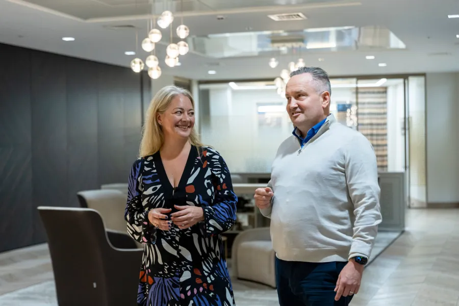 Man and woman talking in meeting