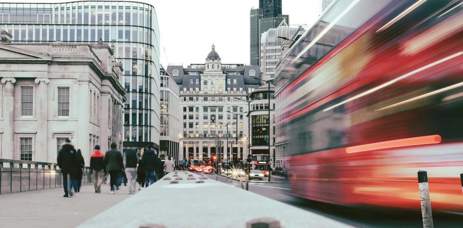 Bus moving along in Bank
